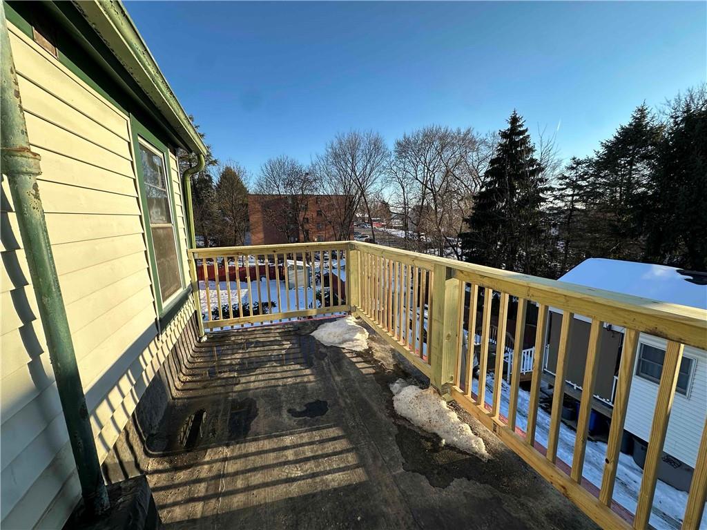 115 Meade Avenue Pittsburgh, PA 15202 - Photo 37 of 38 a view of balcony with wooden floor and fence