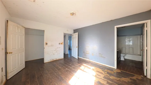 a view of entryway with wooden floor
