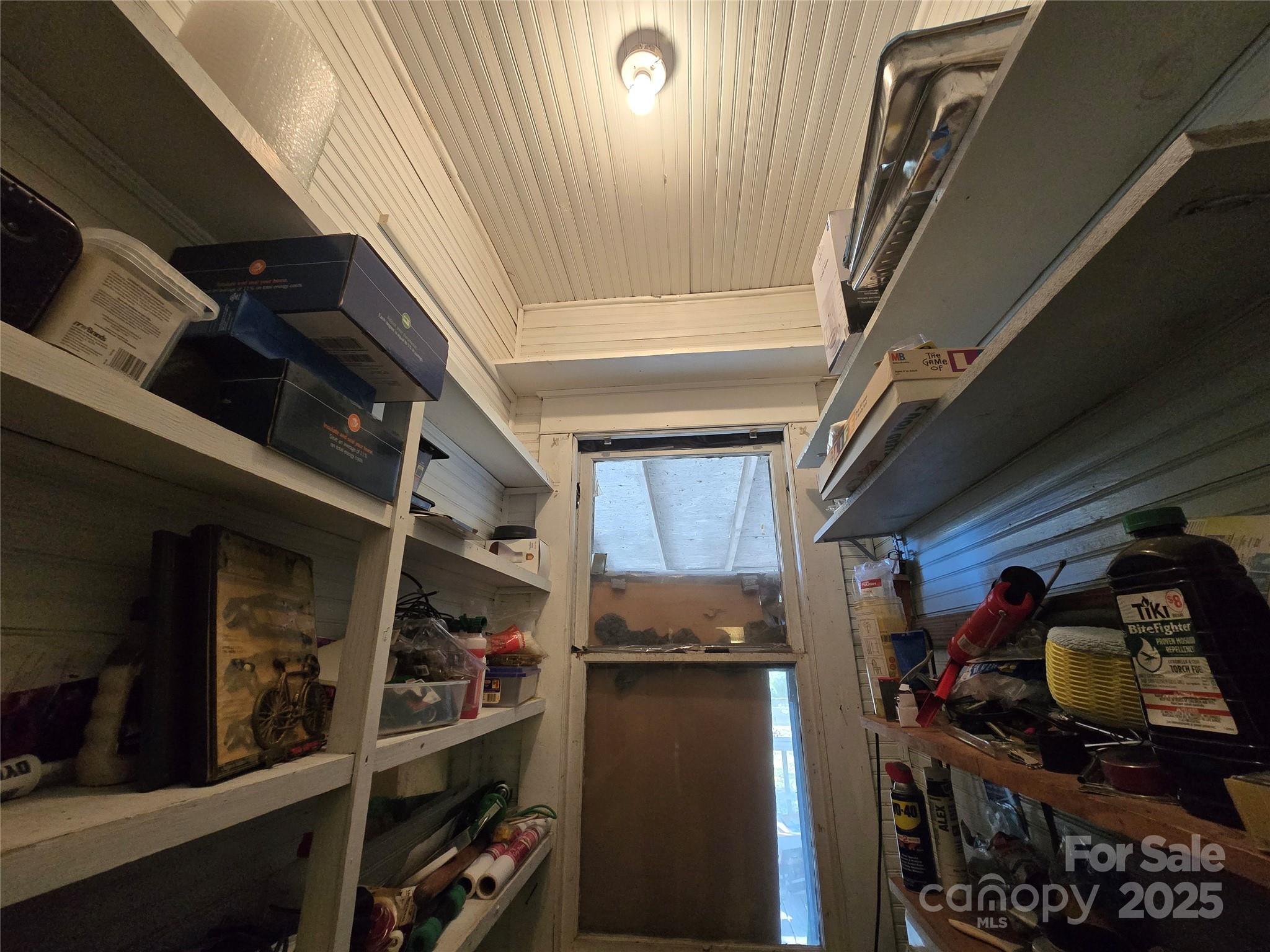 509 5th Street, Unit 5 Spencer, NC 28159 - Photo 11 of 20 a view of walk in closet with clothes and shoes