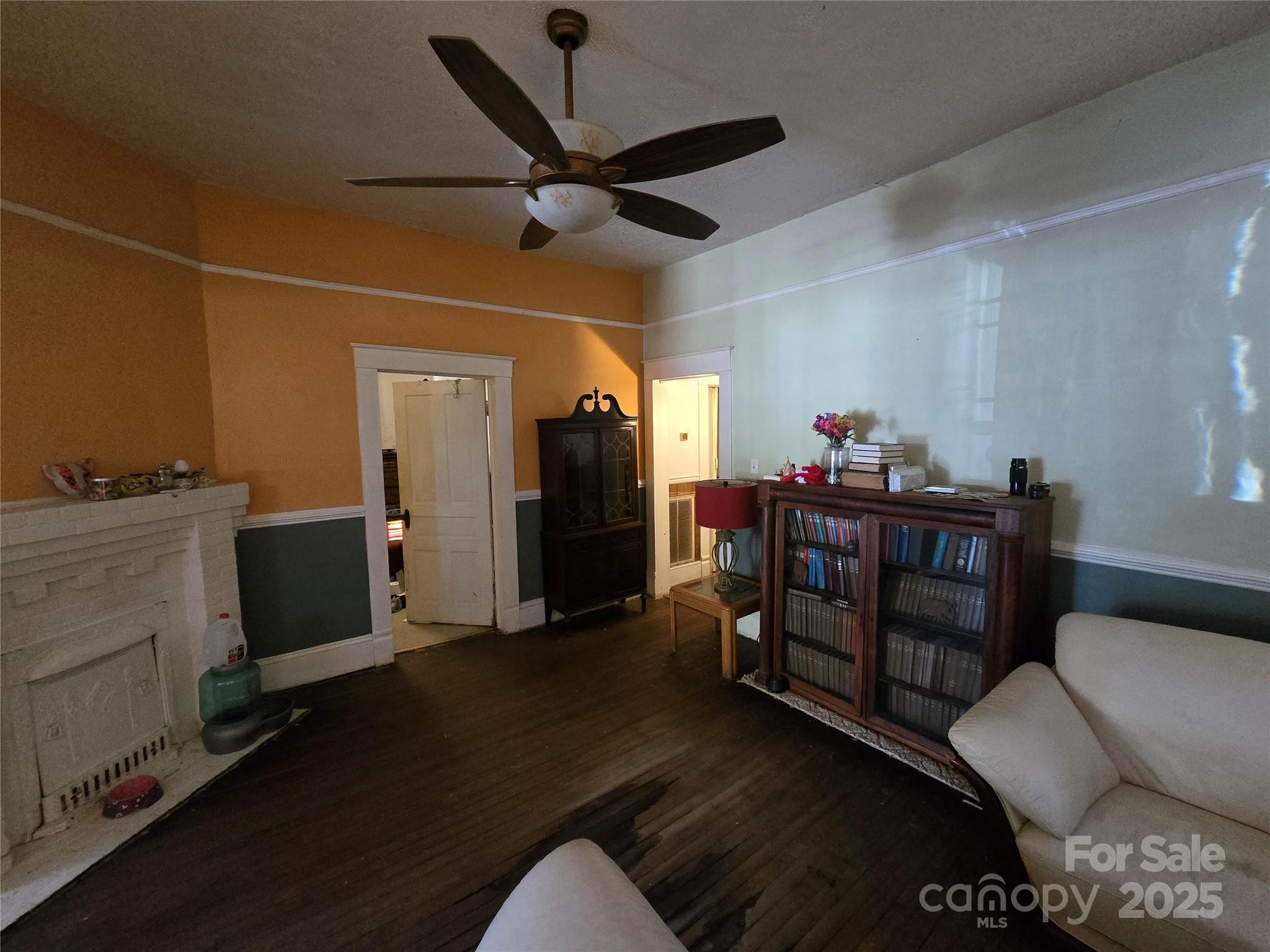 509 5th Street, Unit 5 Spencer, NC 28159 - Photo 15 of 20 a living room with furniture and a wooden floor