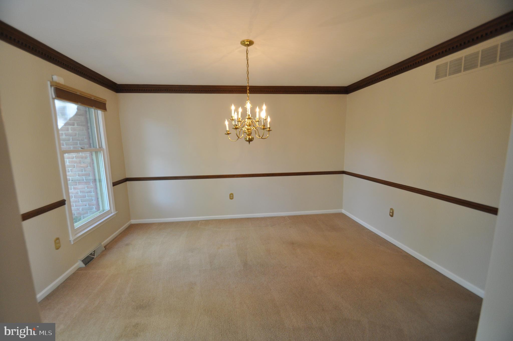 100 Country Flower Road Newark, DE 19711 - Photo 6 of 24 Bonus size dining rm w/ chair rail & crown molding