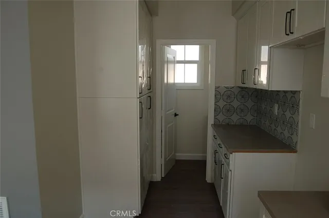 a bathroom with a sink and shower