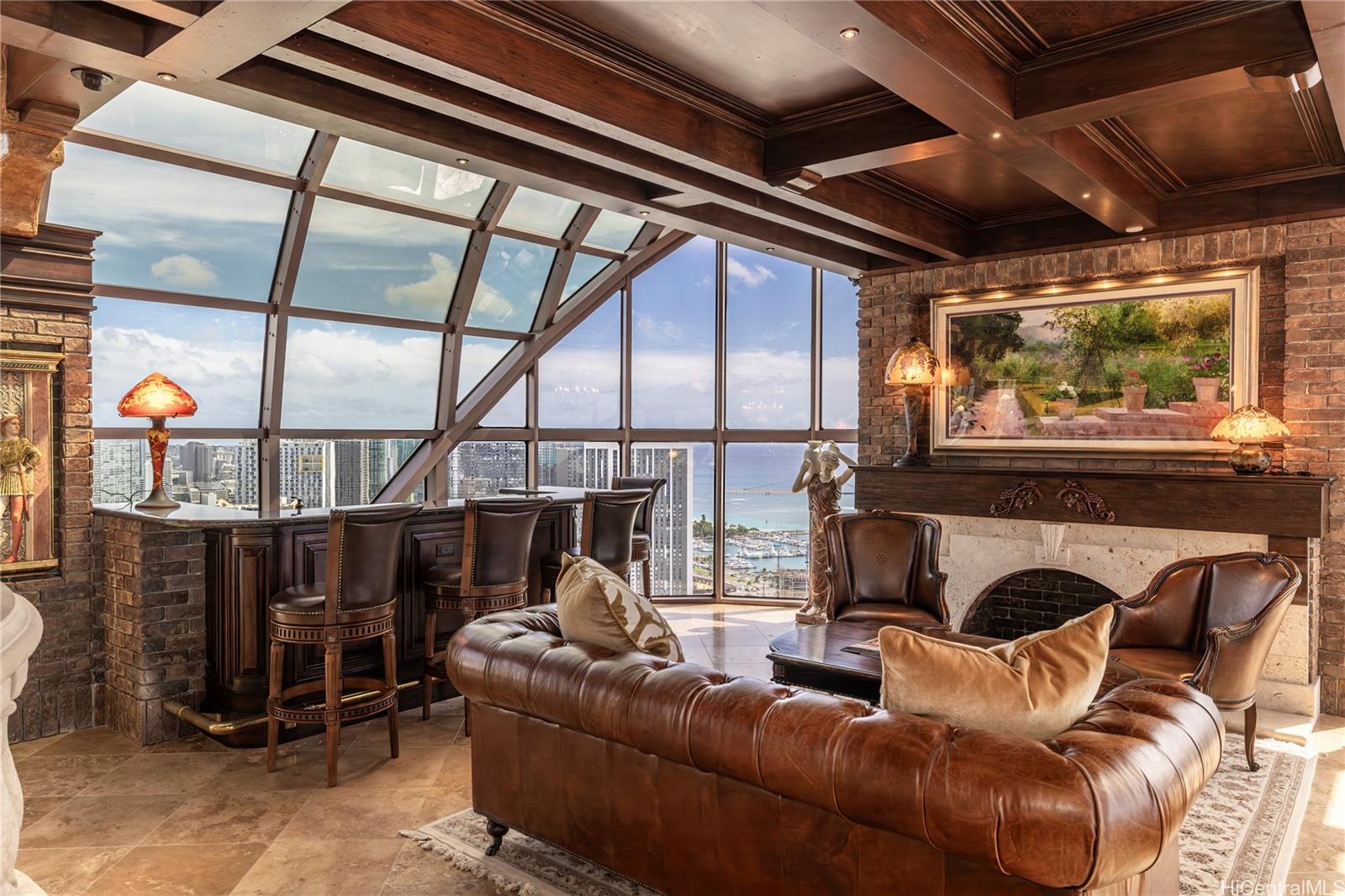 425 South Street, Unit 4501 Honolulu, HI 96813 - Photo 2 of 12 a living room with furniture a fireplace and window