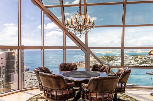 a view of a dining room with furniture window and outside view