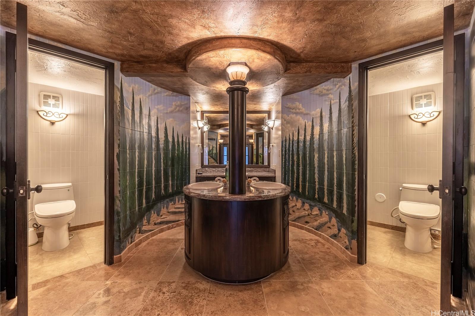 425 South Street, Unit 4501 Honolulu, HI 96813 - Photo 7 of 12 a bathroom with a toilet sink and mirror