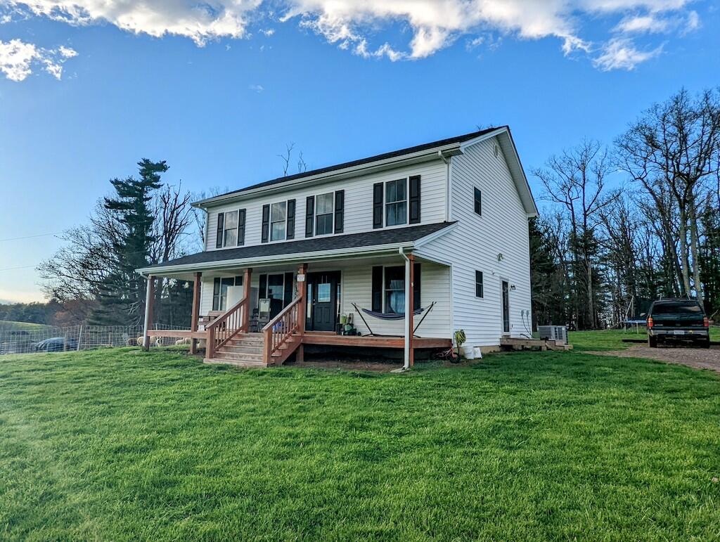 2055 Sunny Ridge Road Northeast Check, VA 24072 - Photo 3 of 35 a front view of a house with garden