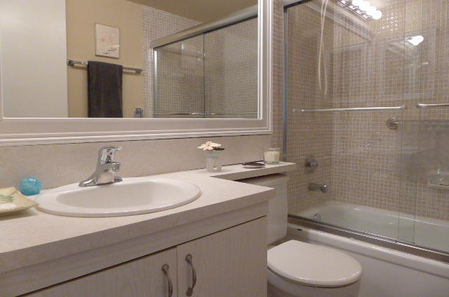 2079 Exeter Boca Raton, FL 33434 - Photo 12 of 17 a bathroom with a sink a toilet and shower