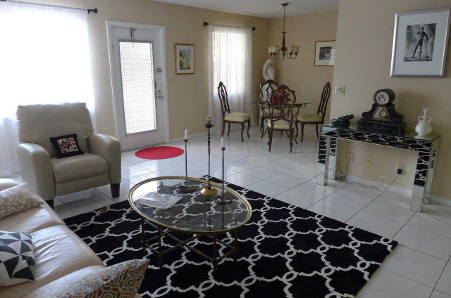 2079 Exeter Boca Raton, FL 33434 - Photo 3 of 17 a living room with furniture and a lamp