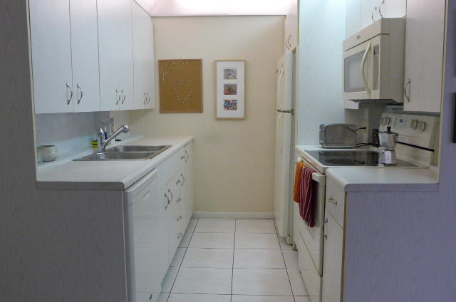 2079 Exeter Boca Raton, FL 33434 - Photo 5 of 17 a kitchen with a sink cabinets and utility