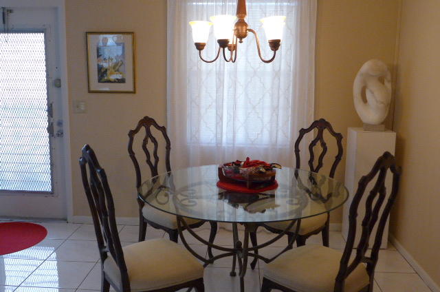 2079 Exeter Boca Raton, FL 33434 - Photo 6 of 17 a view of a dining room that has a table and chair