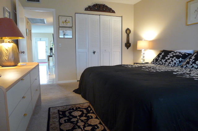2079 Exeter Boca Raton, FL 33434 - Photo 9 of 17 a bedroom with bed and window