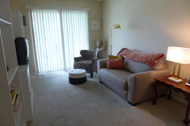 2079 Exeter Boca Raton, FL 33434 - Photo 10 of 17 a living room with furniture and a flat screen tv
