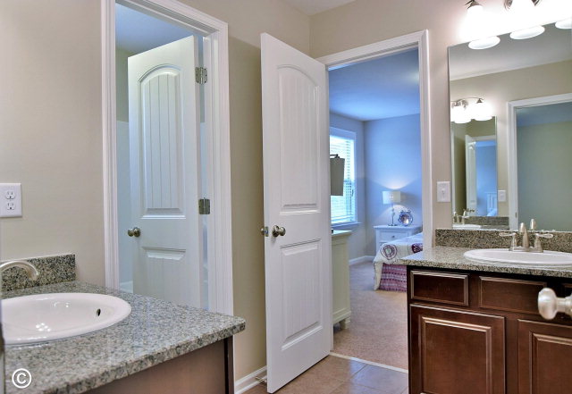 2510 Ridgewood Way Phenix City, undefined 36870 - Photo 15 of 20 a bathroom with a granite countertop sink and a mirror