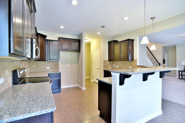 2510 Ridgewood Way Phenix City, undefined 36870 - Photo 5 of 20 a kitchen with stainless steel appliances granite countertop a sink a stove and a refrigerator