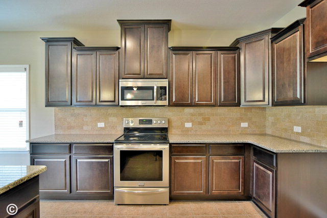 2510 Ridgewood Way Phenix City, undefined 36870 - Photo 6 of 20 a kitchen with stainless steel appliances wooden cabinets and a stove top oven