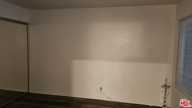 a view of small space with wooden floor