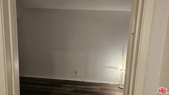 a view of small space with wooden floor