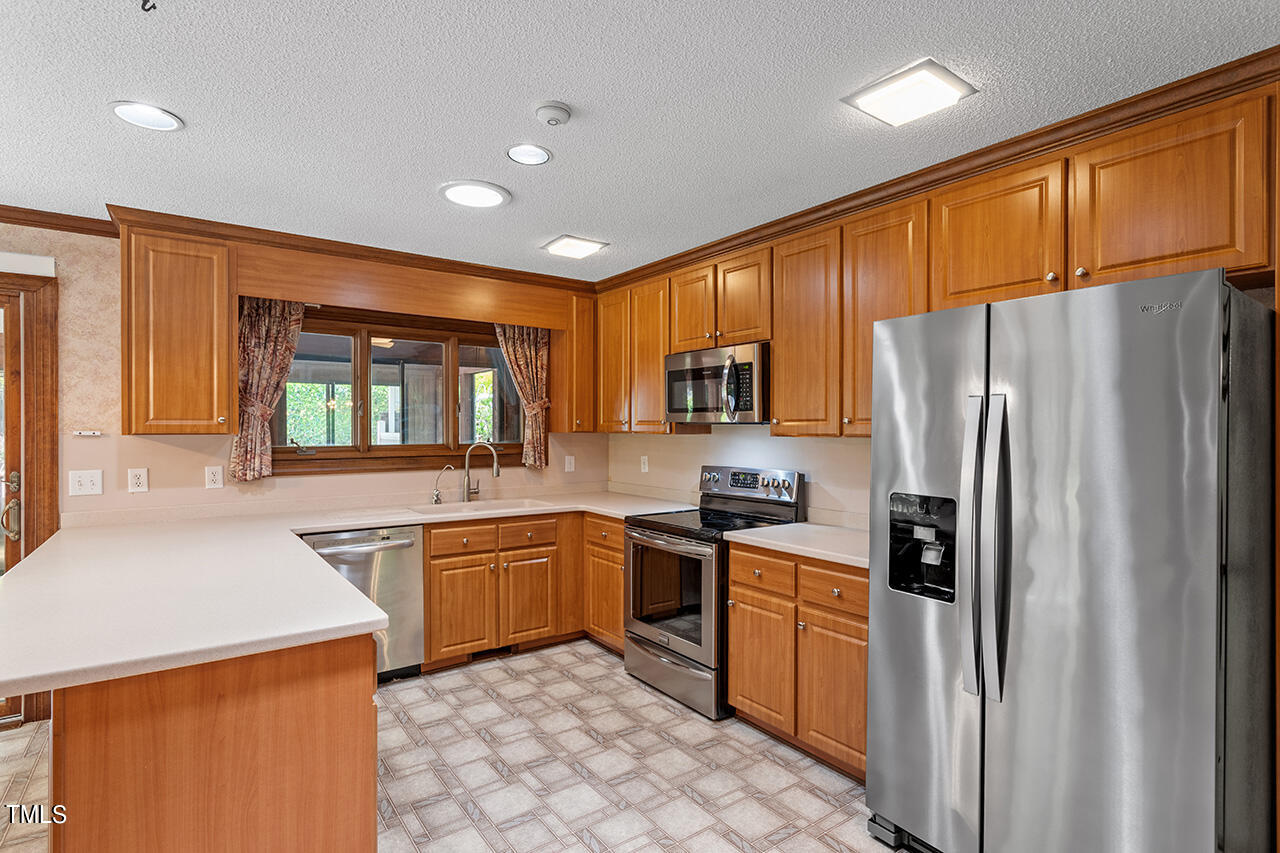 8845 Woodyhill Road Raleigh, NC 27613 - Photo 13 of 34 8845 Woodyhill Road_18