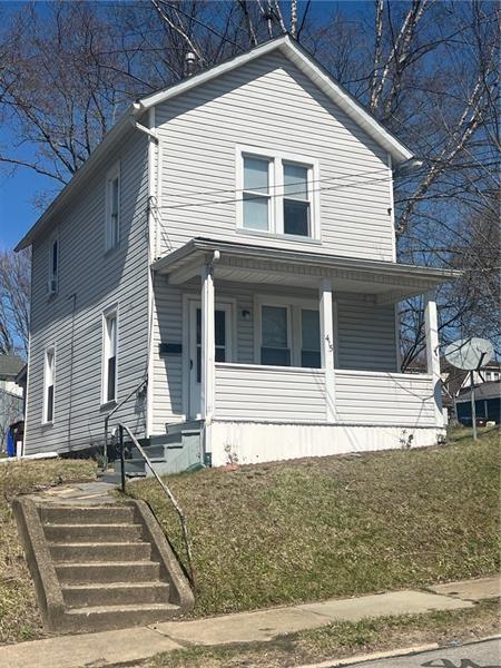 415 Meek Street Sharon, PA 16146 - Photo 2 of 3 a front view of a house