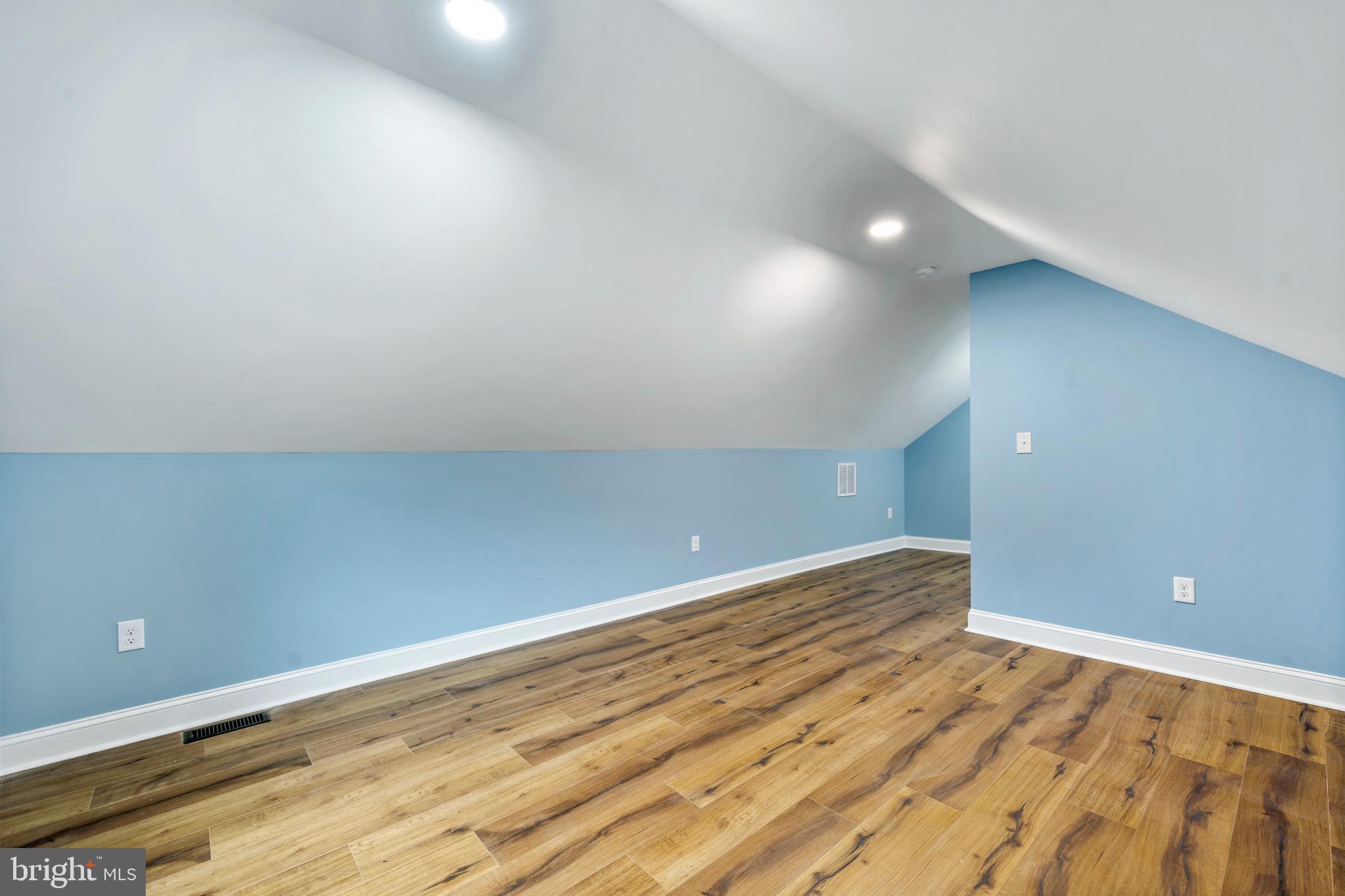 1370 Coster Road Lusby, MD 20657 - Photo 21 of 36 Open upper-level primary suite