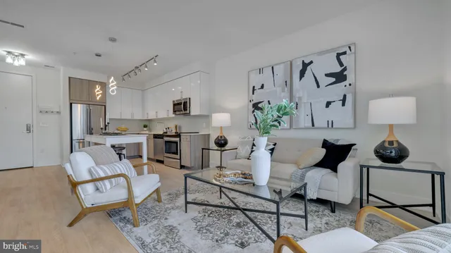 a living room with furniture and a table