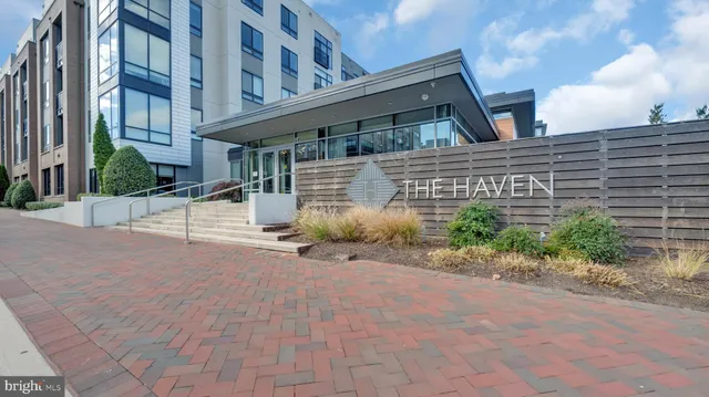 a view of a building with a yard