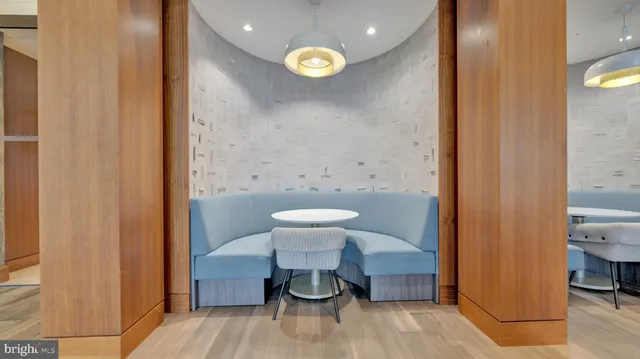 a bathroom with a toilet and a view of bathroom