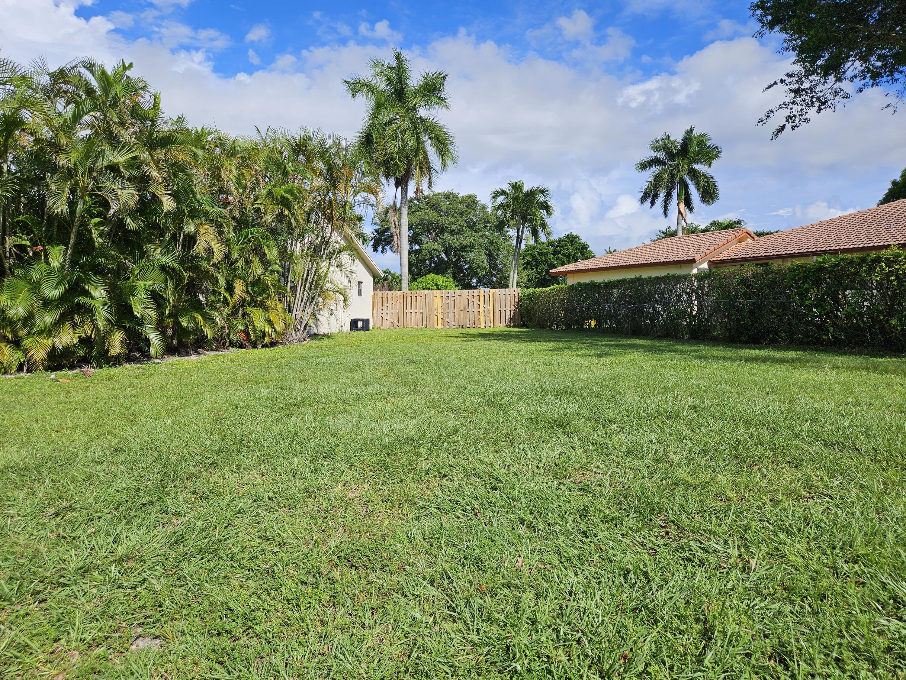 1401 Northwest 14th Avenue Boca Raton, FL 33486 - Photo 34 of 41 Spacious Side Yard