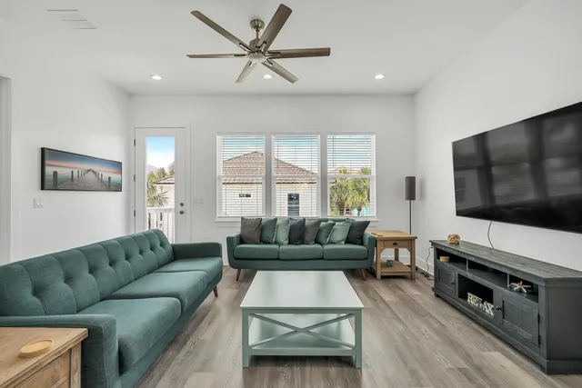 a view of dining room and hall with wooden floor