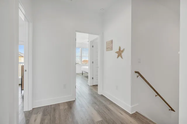 a view of a balcony with wooden floor