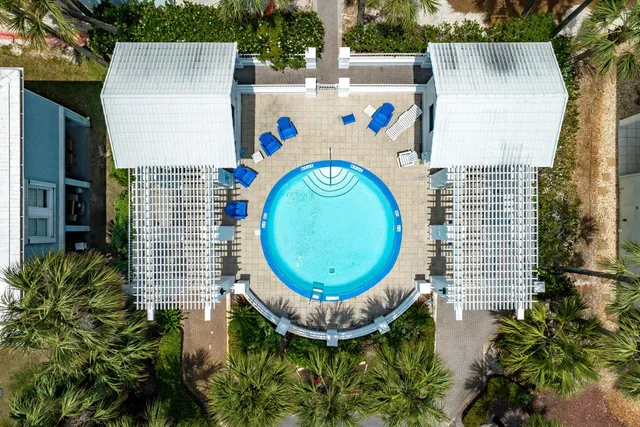 a view of a balcony with furniture