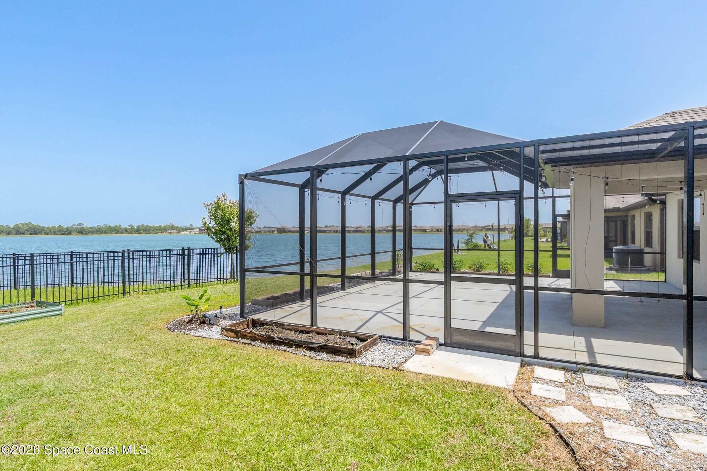 3419 Foggy Mist Road Southeast Palm Bay, FL 32909 - Photo 26 of 39 Screened Lanai
