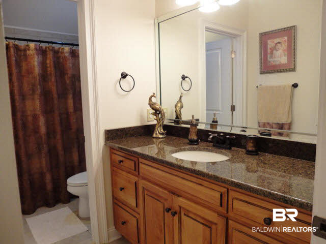 9051 Krystal Ridge Court Daphne, AL 36526 - Photo 20 of 28 Granite Counter top & tile flooring