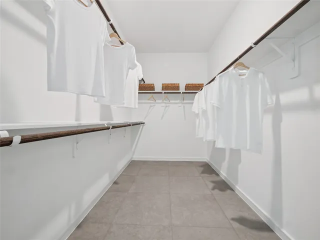a view of bathroom with bathtub and shower