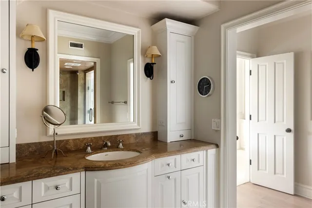 a bathroom with a tub sink and window