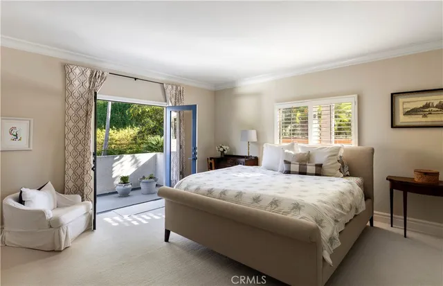 a bathroom with a double vanity sink a mirror a and a window