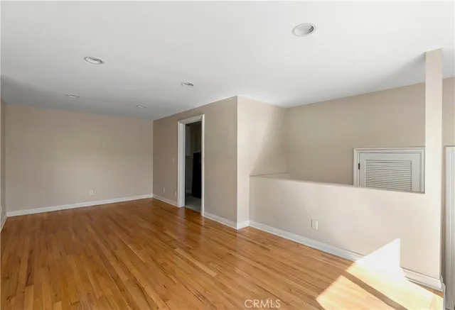 a view of a house with swimming pool and sitting area