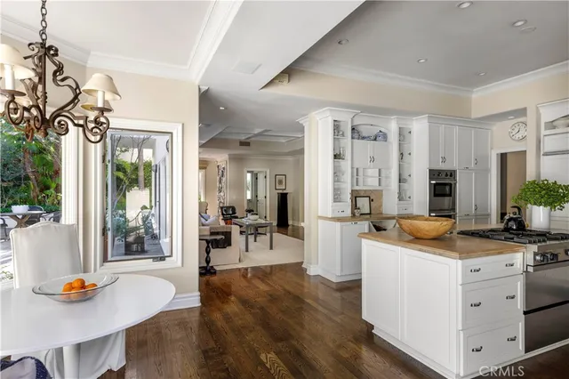 a view of cabinets a washer and dryer