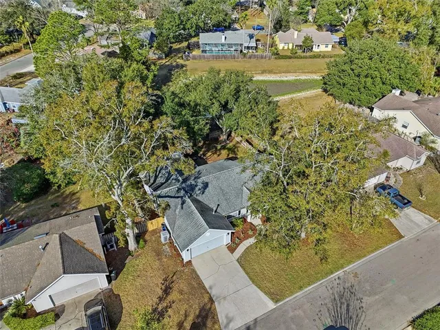 a view of swimming pool with a yard and seating area