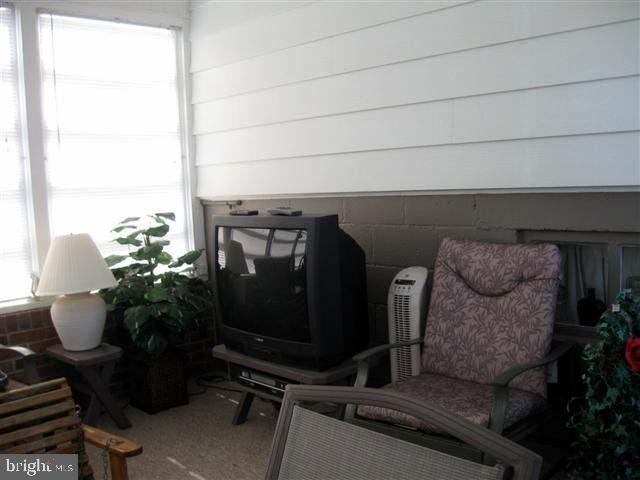 73 North Walnut Street Spring Grove, PA 17362 - Photo 22 of 30 a living room with furniture and flowers