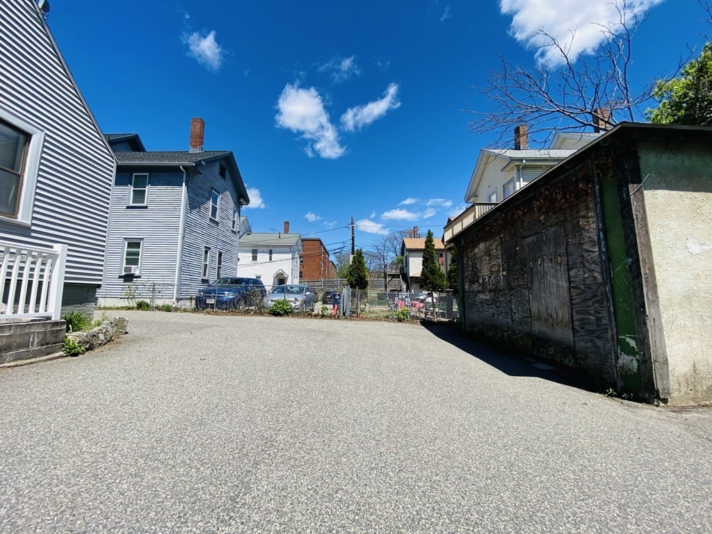 48 Allston Street, Unit 2 Boston, MA 02134 - Photo 23 of 24 a view of a street with potted plants