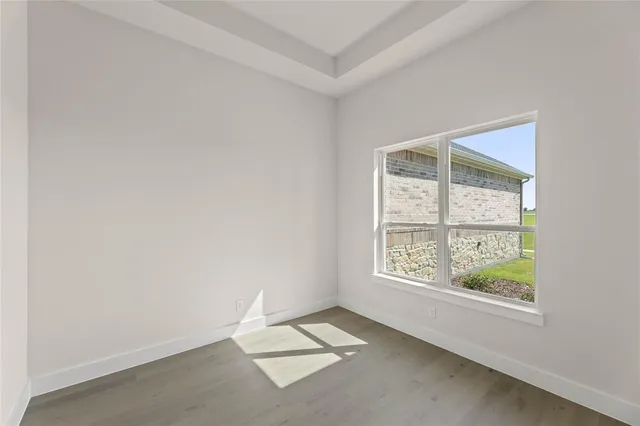 an empty room with windows