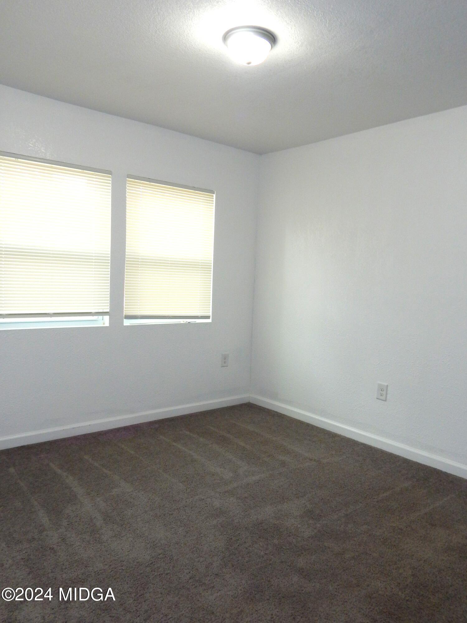 3835 Kings Park Circle Macon, GA 31217 - Photo 13 of 15 an empty room with a window
