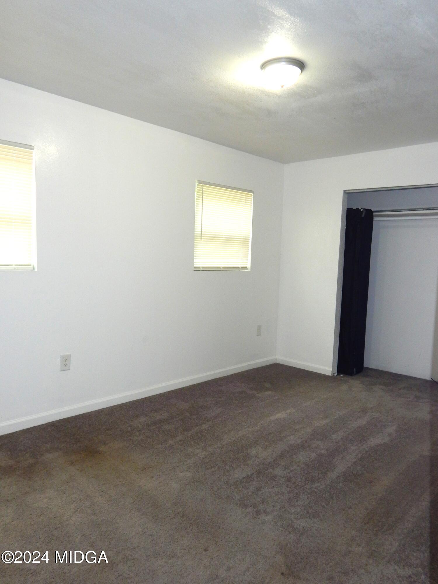 3835 Kings Park Circle Macon, GA 31217 - Photo 8 of 15 an empty room with a window