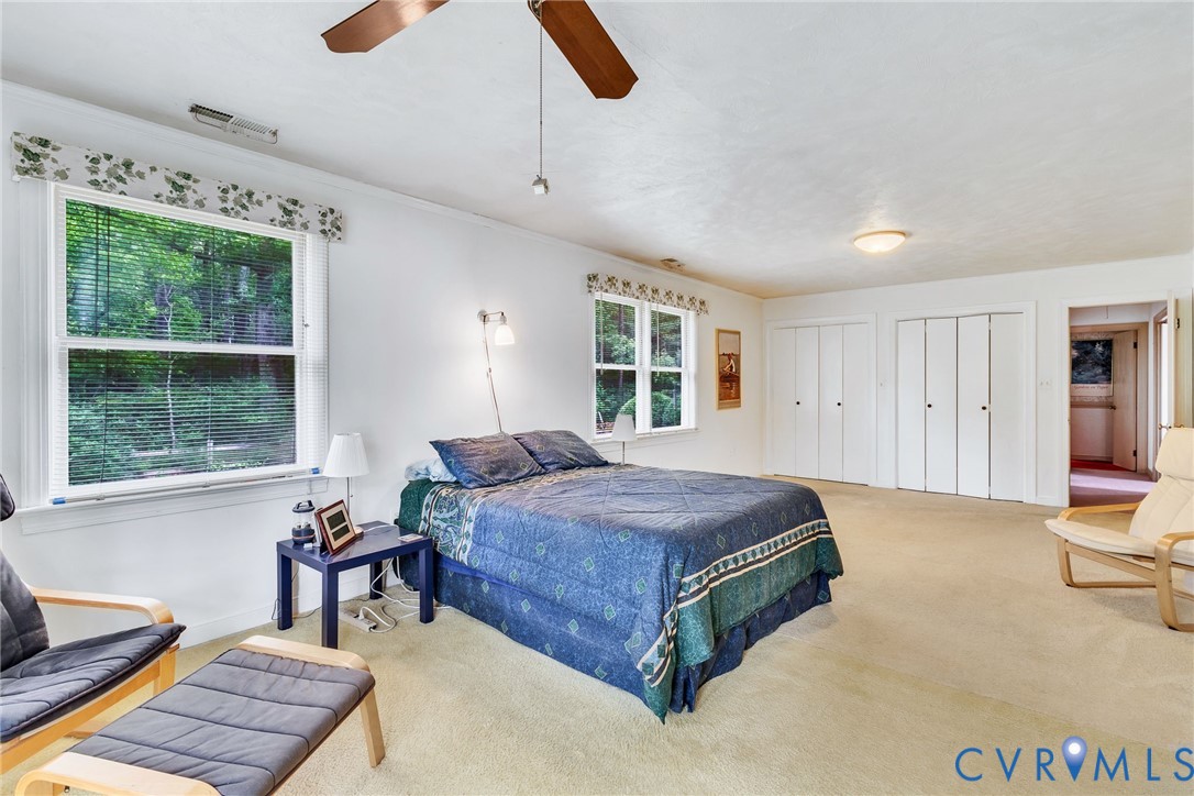 142 Bridge Lane Reedville, VA 22539 - Photo 14 of 56 a bedroom with furniture and a window