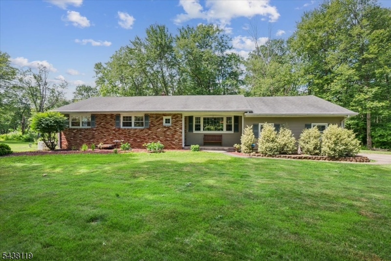 335 Drakestown Road Long Valley, NJ 07853 - Photo 2 of 34 a view of a house with a yard table and chairs