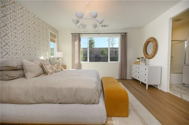 a bathroom with a double vanity sink mirror and shower