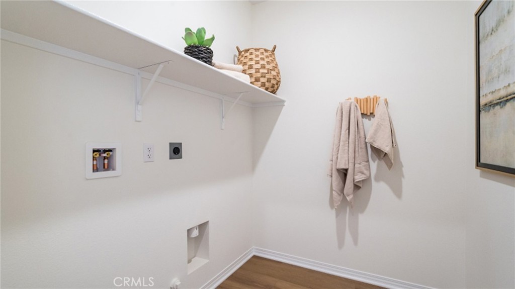 366 Sea Bright Road Perris, CA 92570 - Photo 18 of 21 a view of small space with racks on the wall