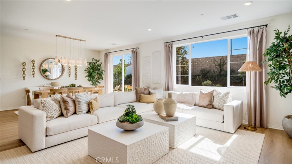 366 Sea Bright Road Perris, CA 92570 - Photo 6 of 21 a living room with furniture and a large window