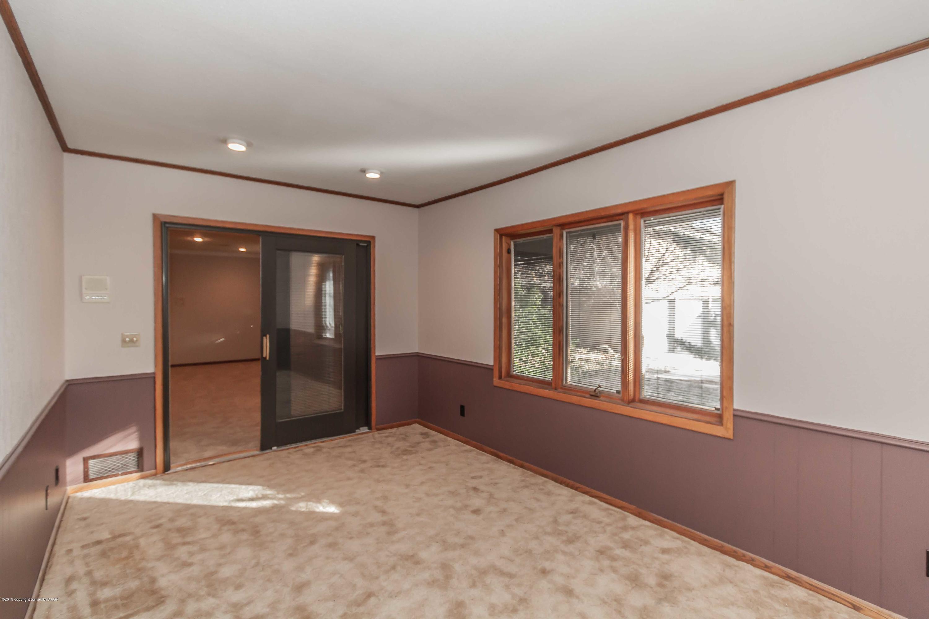 6801 Green Haven Road Amarillo, TX 79110 - Photo 45 of 65 a view of an empty room with window and closet area